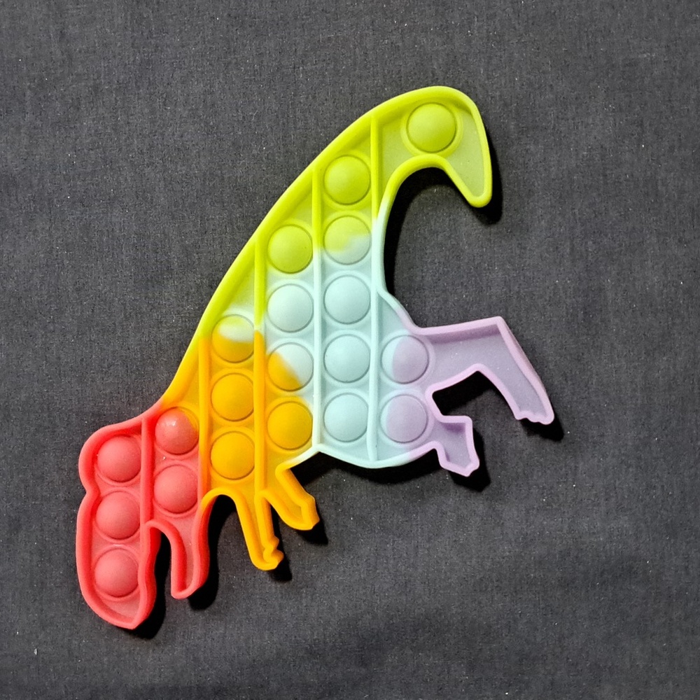 Rubber Rainbow Dino Pop Mat